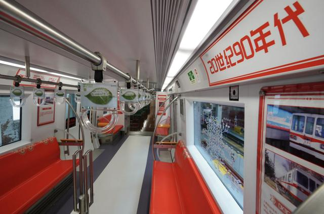 Students play online games inside a subway train in Beijing